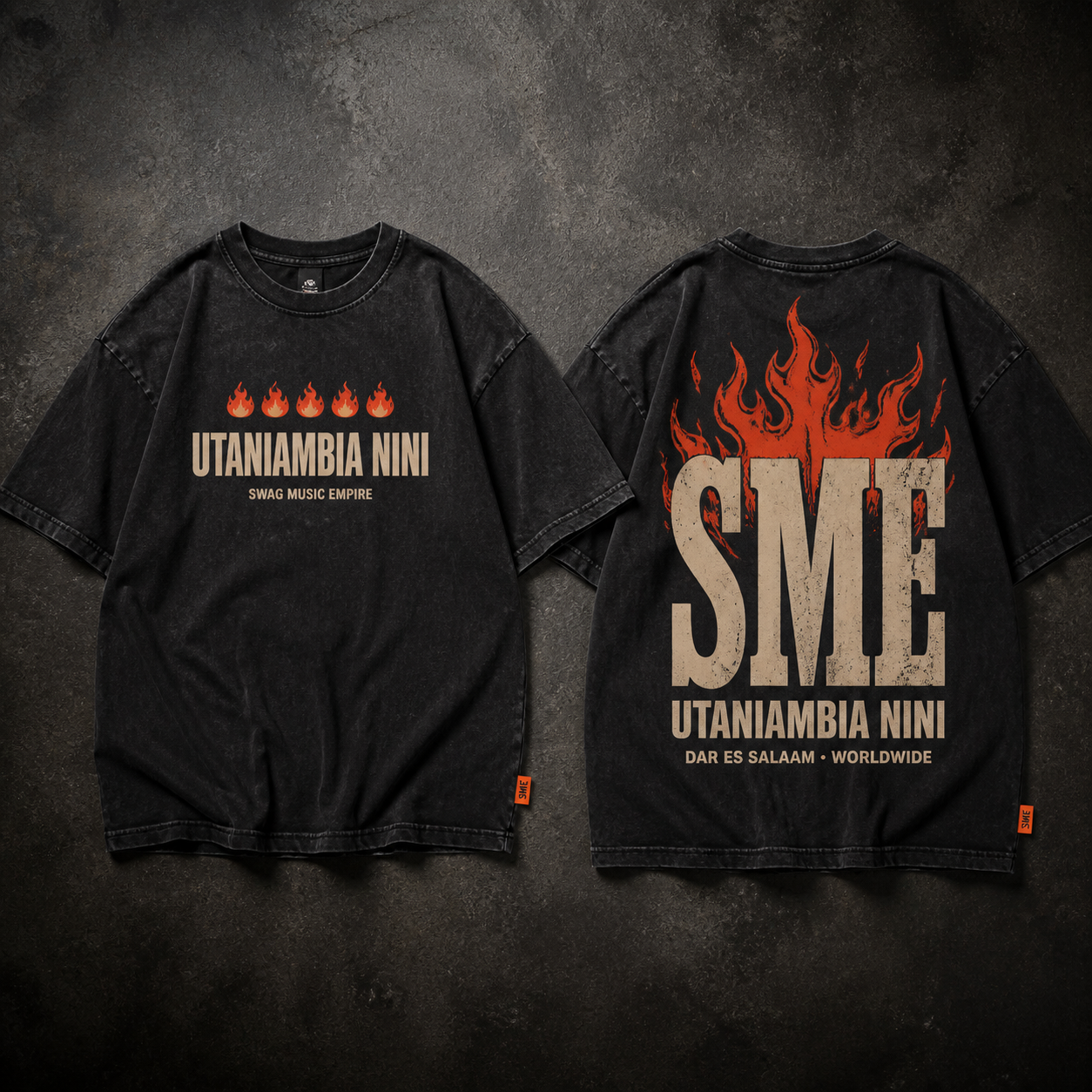 Utaniambia Nini Fire Edition: front with five flames and title, back with large SME flame graphic on washed-black oversized T-shirt